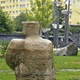 Sedící figura je už zpátky na Novodvorské